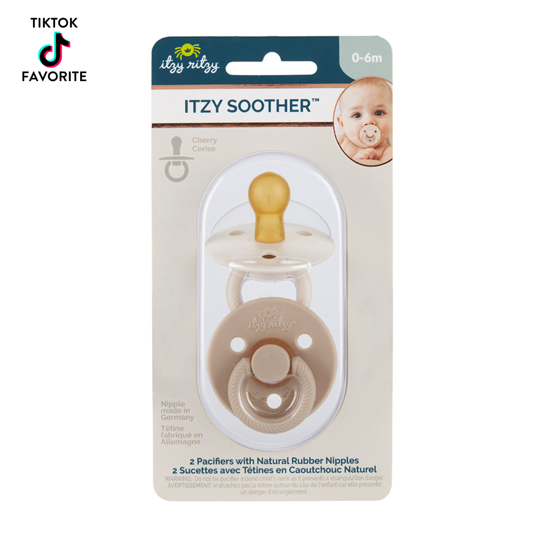 Itzy Ritzy Itzy Sootherβ’ natural rubber pacifiers for 0-6 months, featuring a cherry design, eco-friendly and soothing.