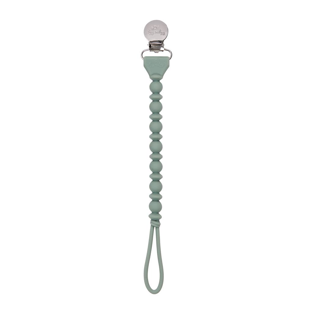Sweetie Strap™ green silicone pacifier clip with braided design, keeping pacifiers safe and stylish.