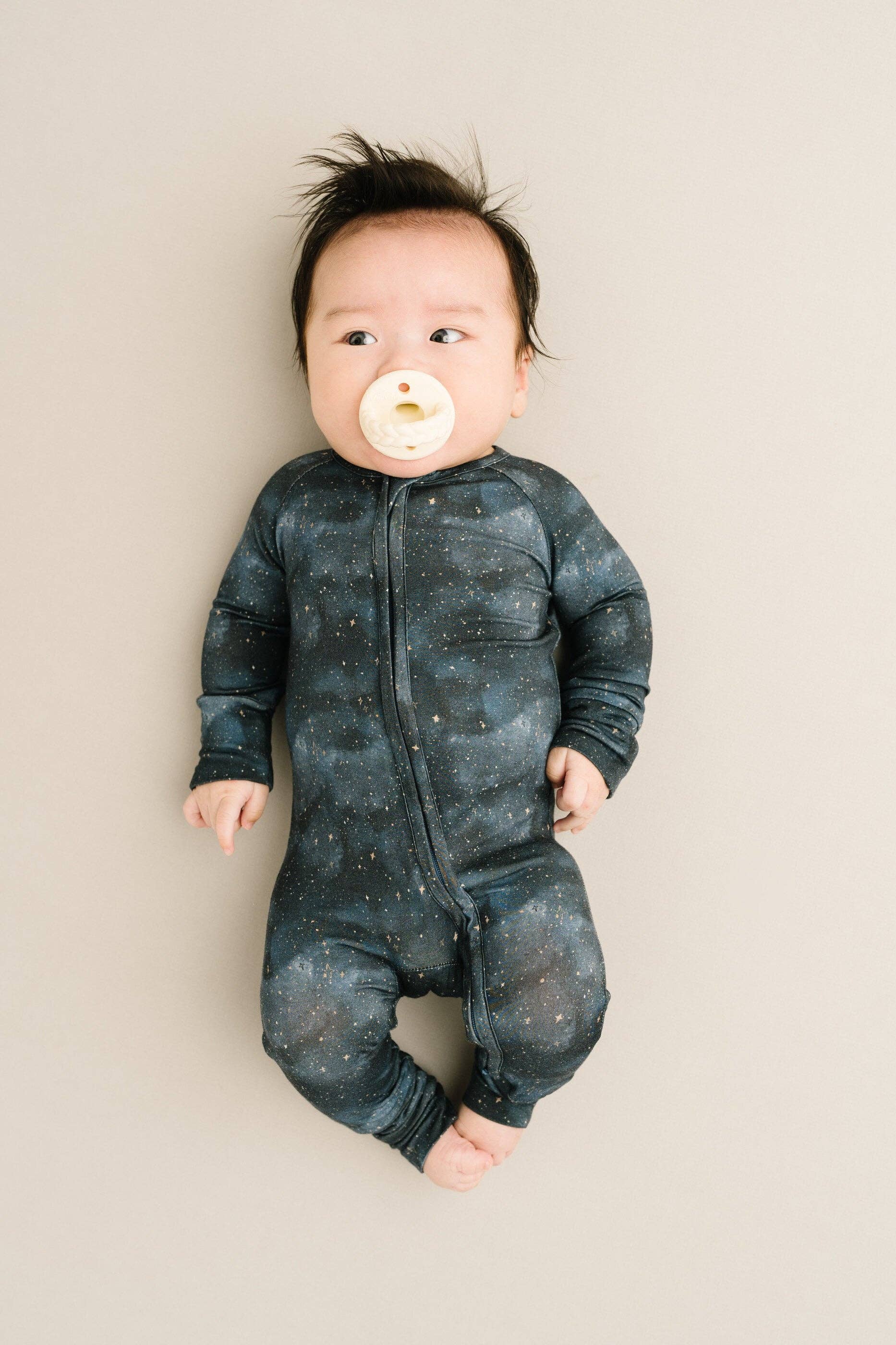 Baby in Moonlight Bamboo Sleeper by Little One Shop, 6-12M, made from soft bamboo viscose with stretch for cozy nighttime comfort.